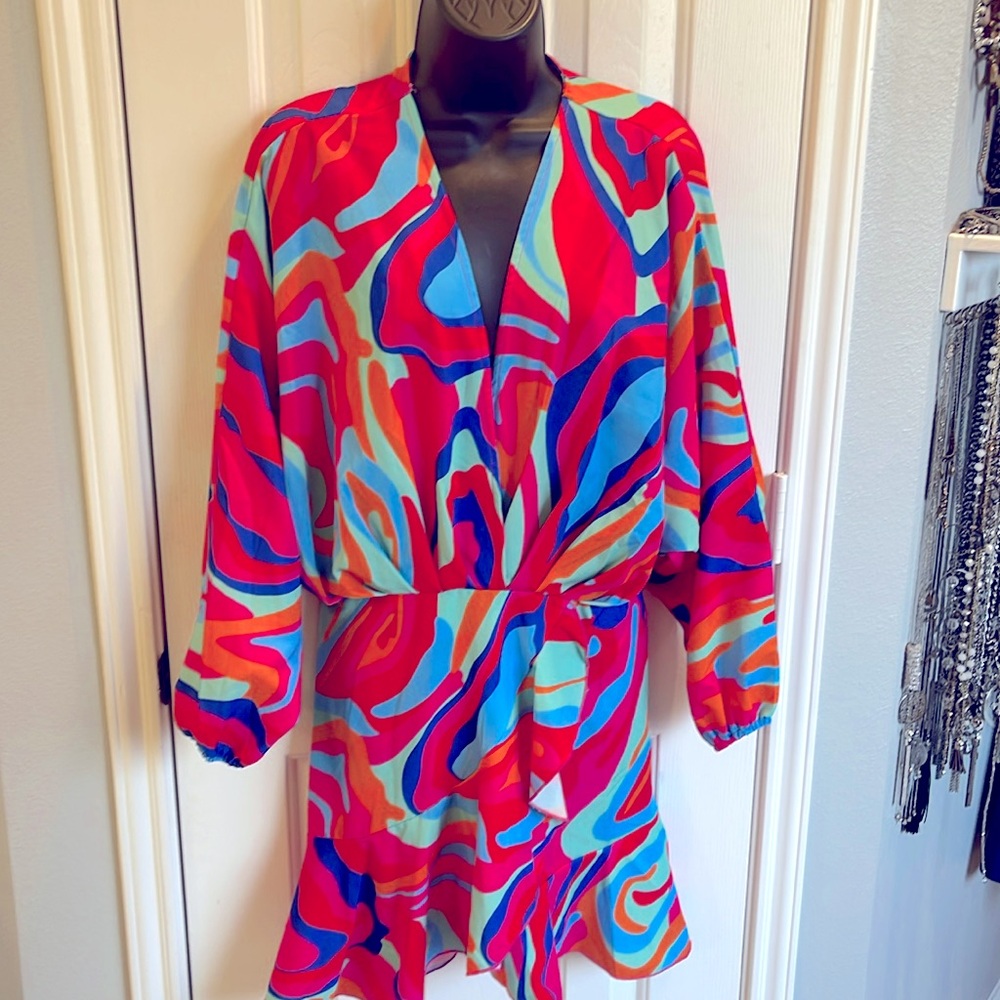 Multi colored dress with long sleeves size M. NWOT